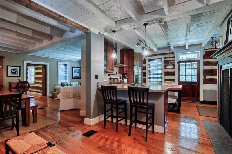 kitchen with beamed ceiling painted white