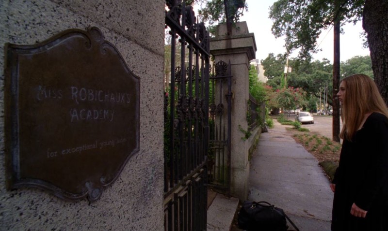 iron gates with sign saying Robichaux Academy