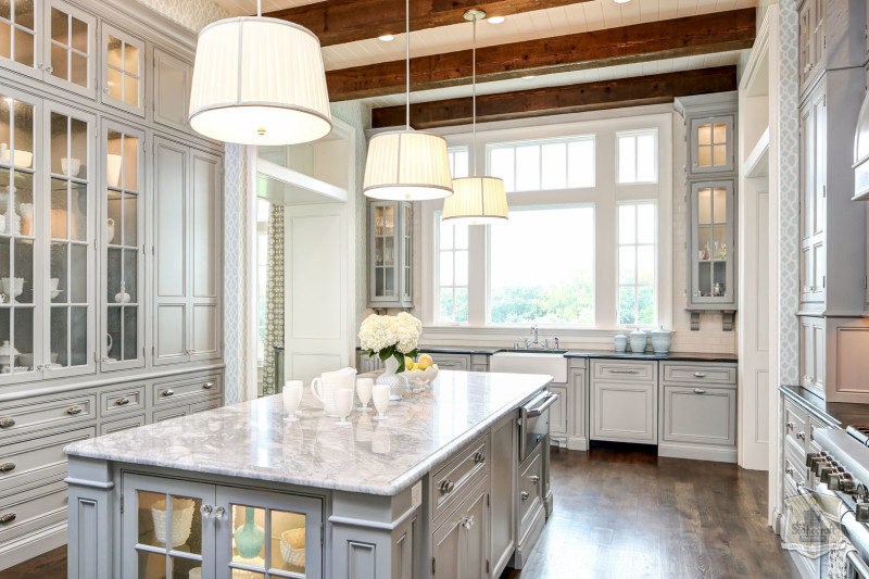 A kitchen with a sink and a window