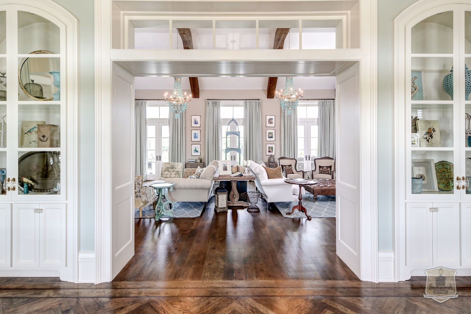 furnished living room with beamed ceiling