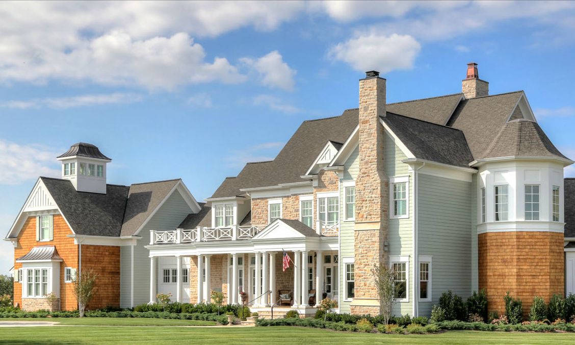 Greystone Country House with front porch in Kentucky built by Stonecroft Homes