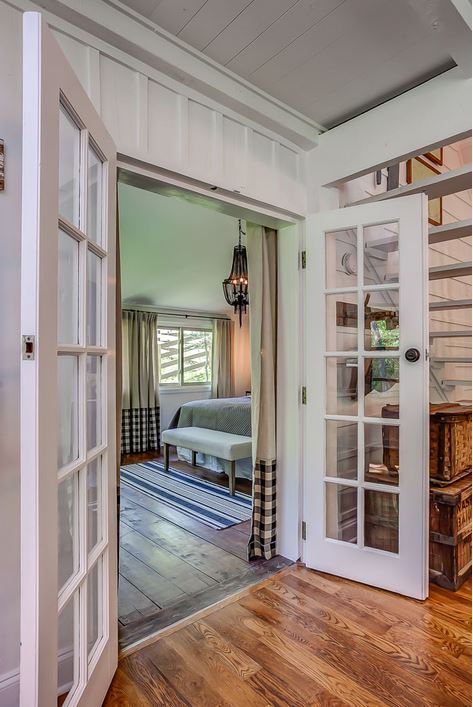 french doors leading to bedroom off living room