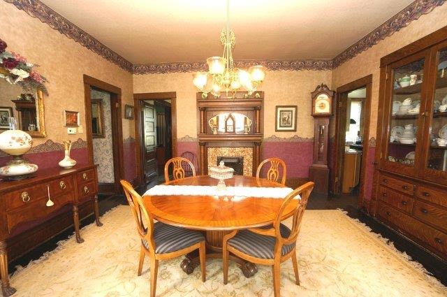 dining room with original antique fireplace