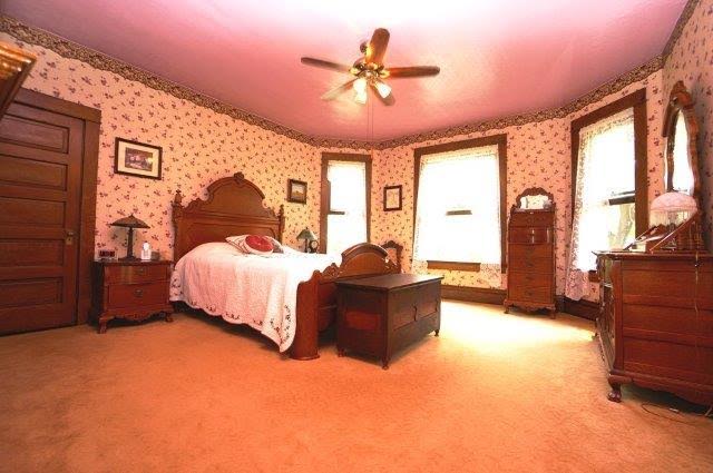 antique bed in upstairs bedroom