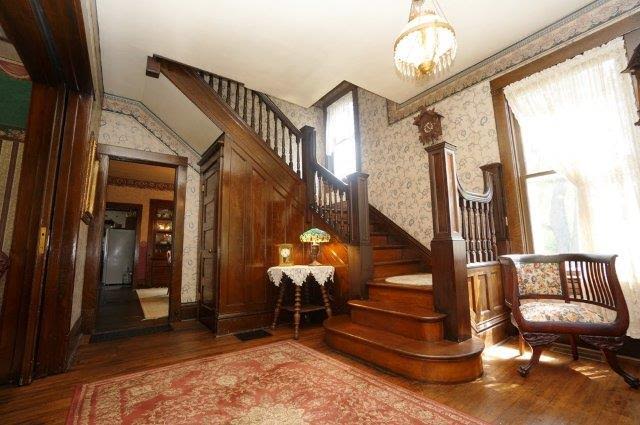 staircase in front entry of house