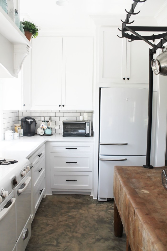 Vintage looking white Smeg refrigerator in kitchen