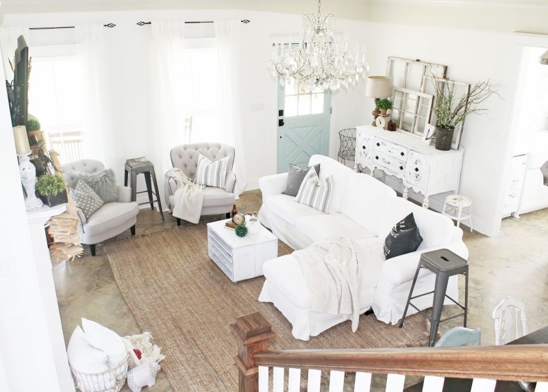 Overhead view of farmhouse living room with white slipcovered sofa