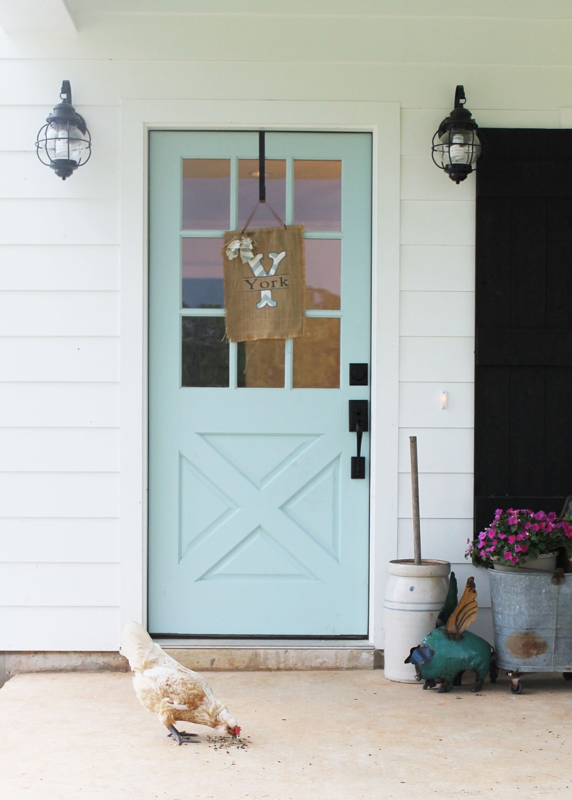 Close up of front door painted pale blue