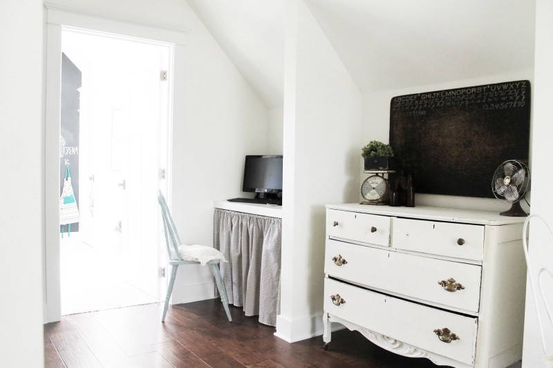 upstairs landing with small desk and computer