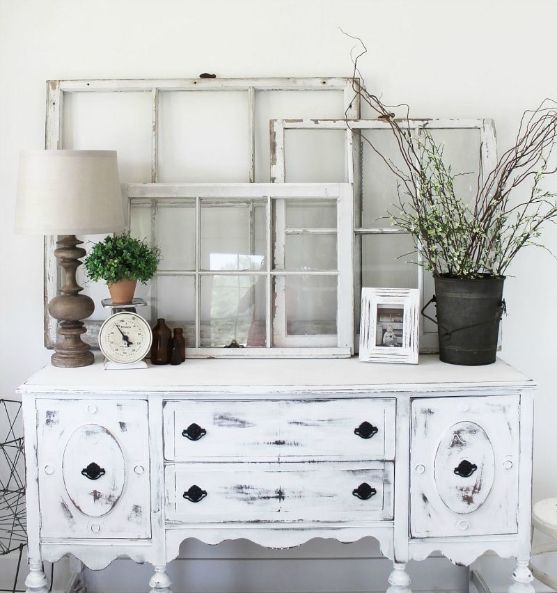 distressed white dresser in entry way