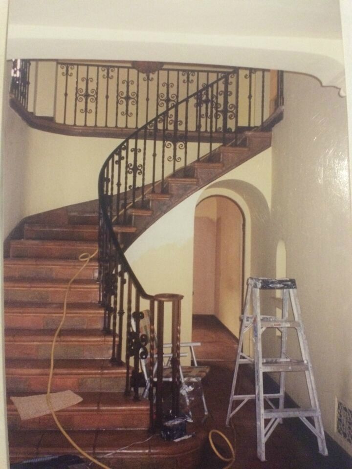 curving staircase before remodel
