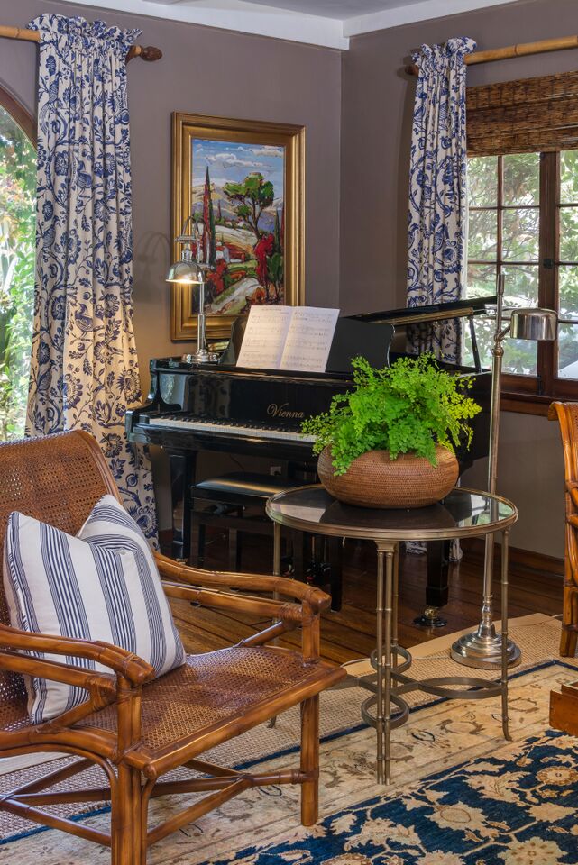 grand piano in corner of living room