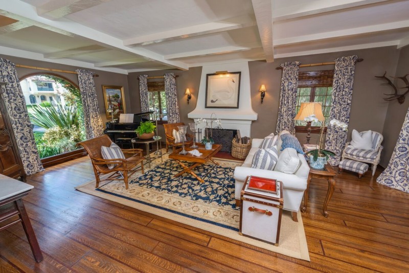 A living room with large fireplace after remodel