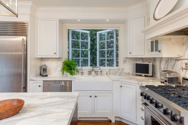 windows open over kitchen sink