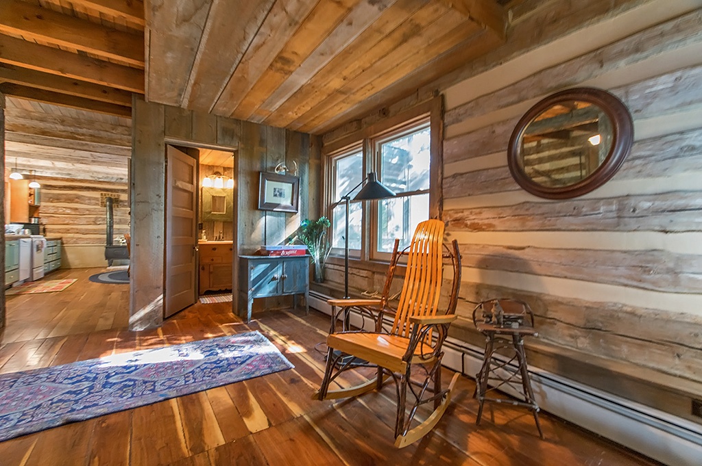 rocking chair in log cabin