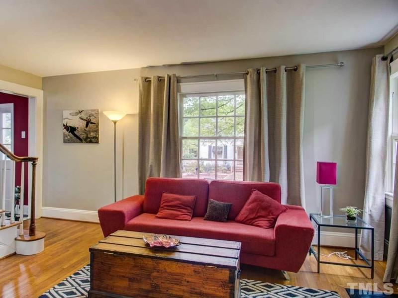 Living room with red sofa