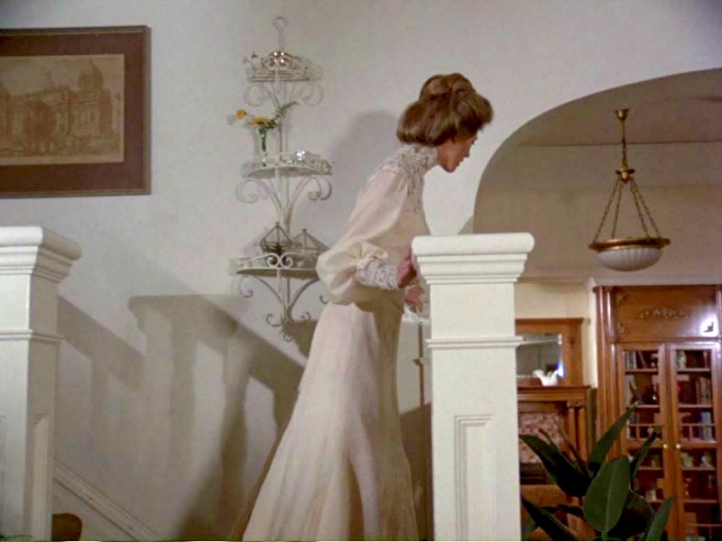 Lindsay Wagner coming downstairs in the Victorian dress