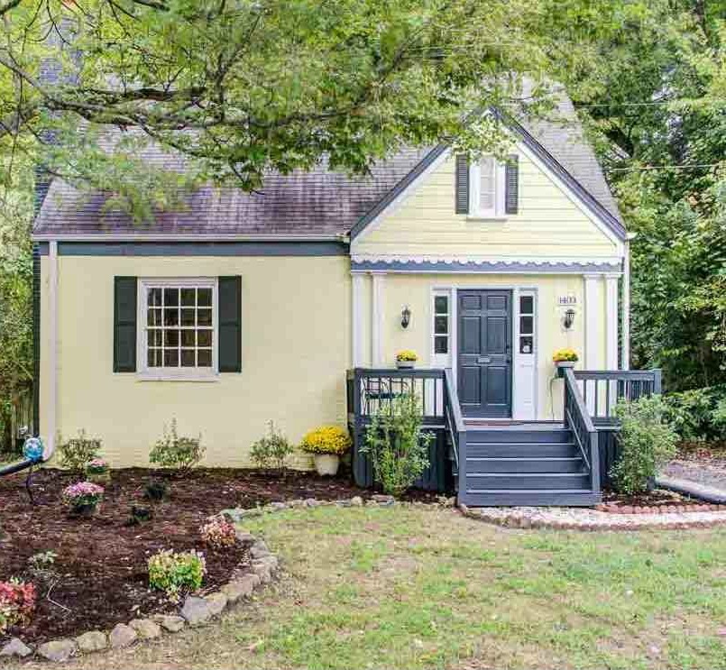 Yellow bungalow featured on LIOLI For Sale in Raleigh NC