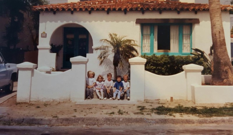 old photo with kids in front of house