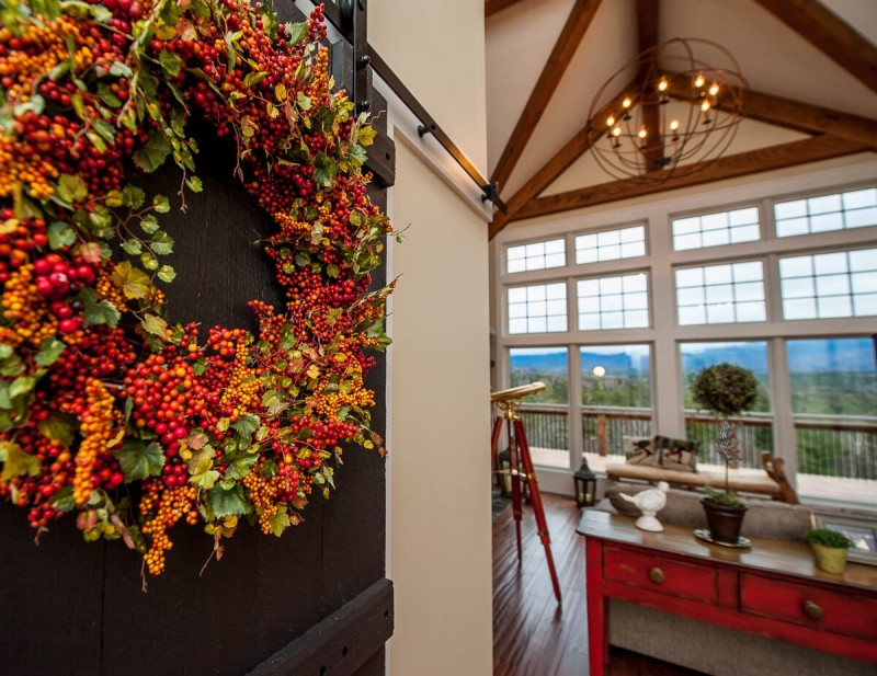 house built to look like a barn front door