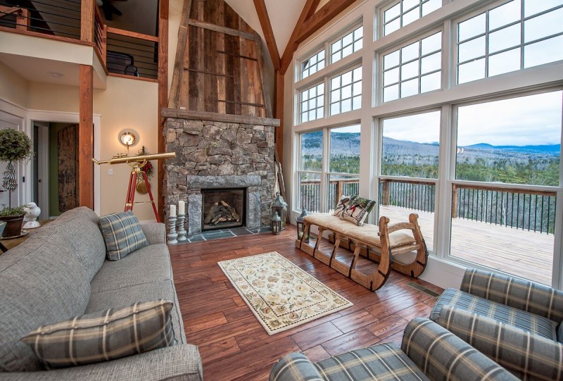 A living room filled with furniture and a fire place