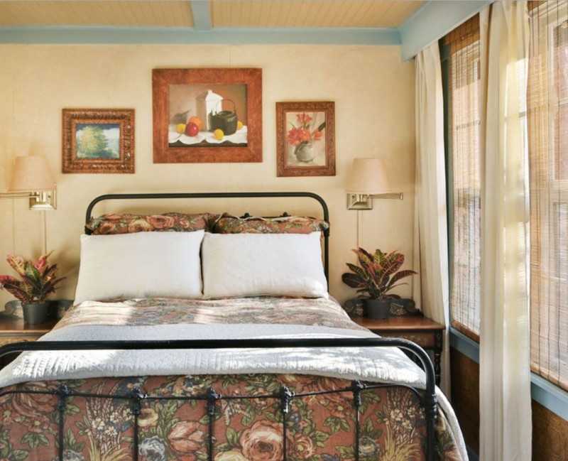 Bedroom with wrought-iron headboard