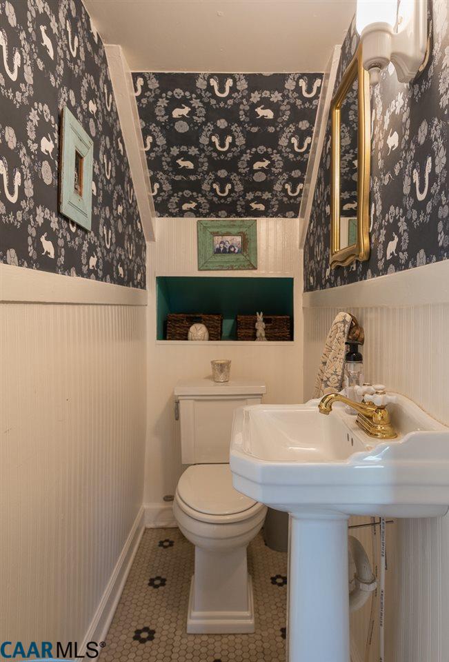 Small powder room with slanted ceiling