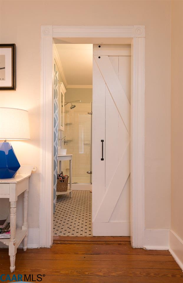 Barn door leading to bathroom