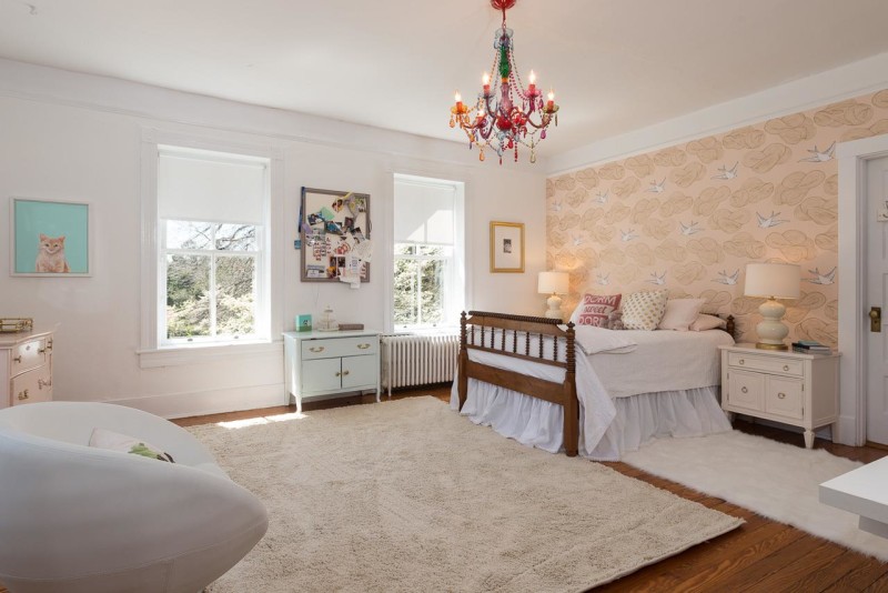 Bedroom with wallpapered feature wall