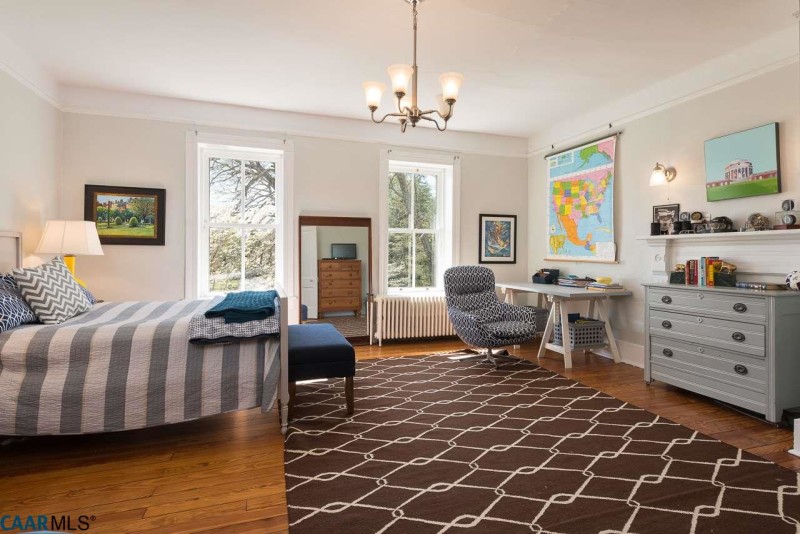 Bedroom with vintage light fixture