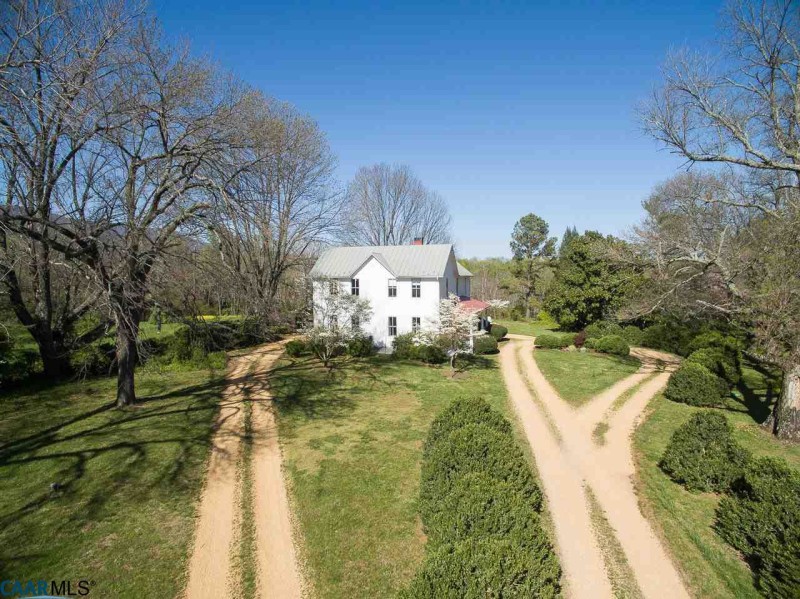 aerial view of white farmhouse