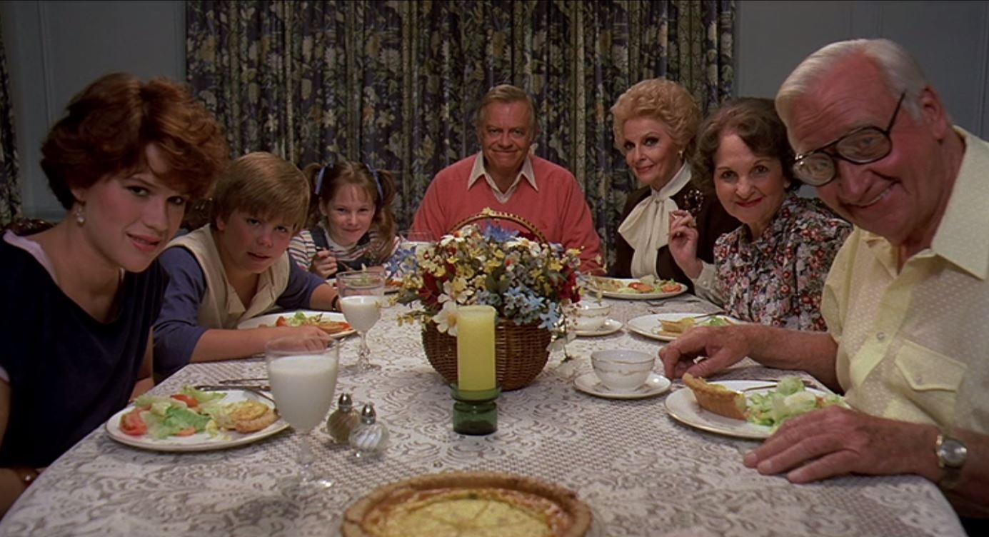 Justin Henry, Max Showalter, Carole Cook, Billie Bird sitting at dining table