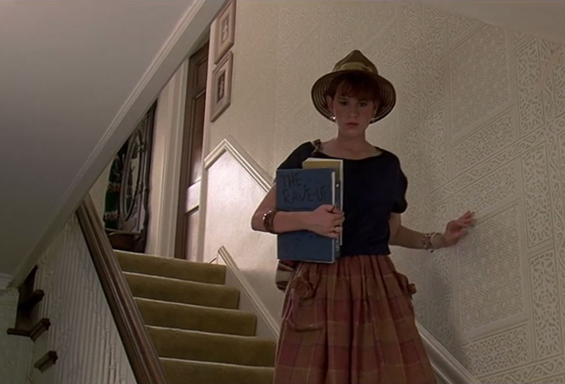 Molly Ringwald walking downstairs