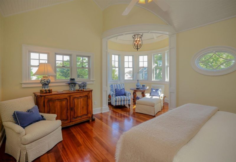 Yellow bedroom with turret in one corner