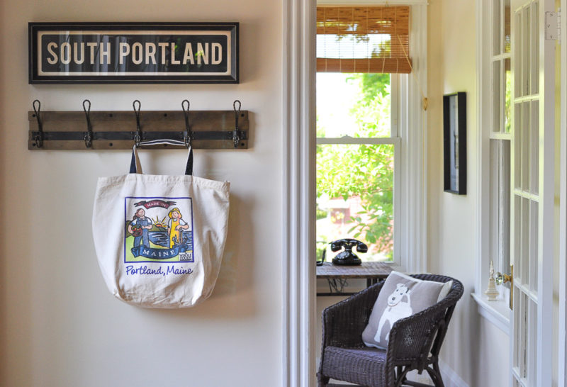 Inside remodeled bungalow with Portland sign on wall