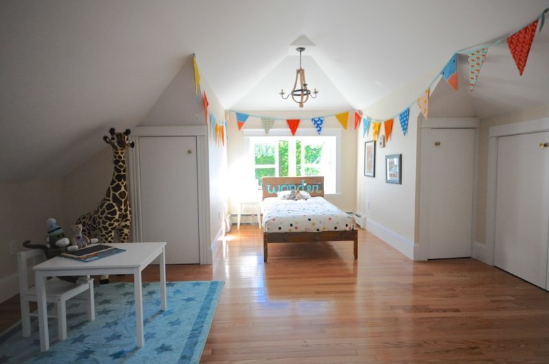 Child\'s bedroom with bed in dormer window