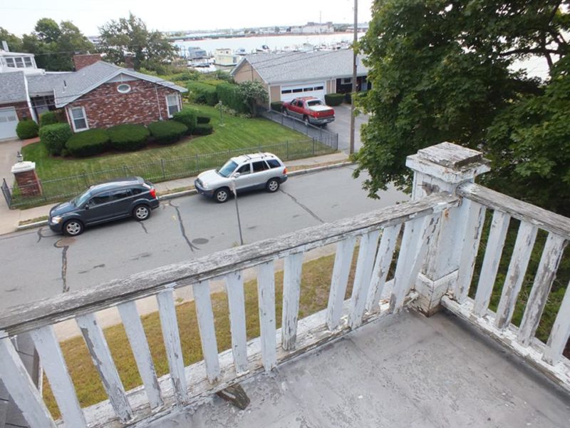 View of street from upstairs balcony