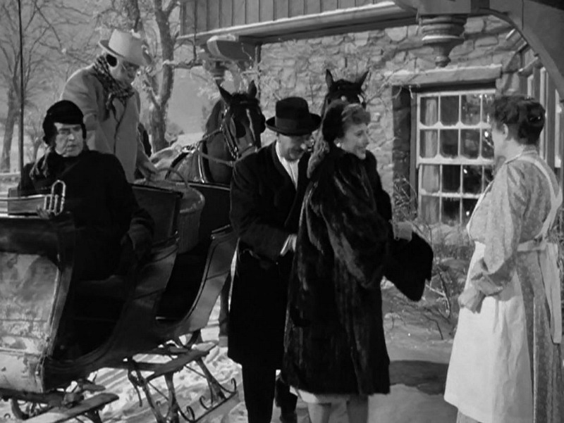 Elizabeth Lane and friends arrive at the farmhouse by horse and sleigh