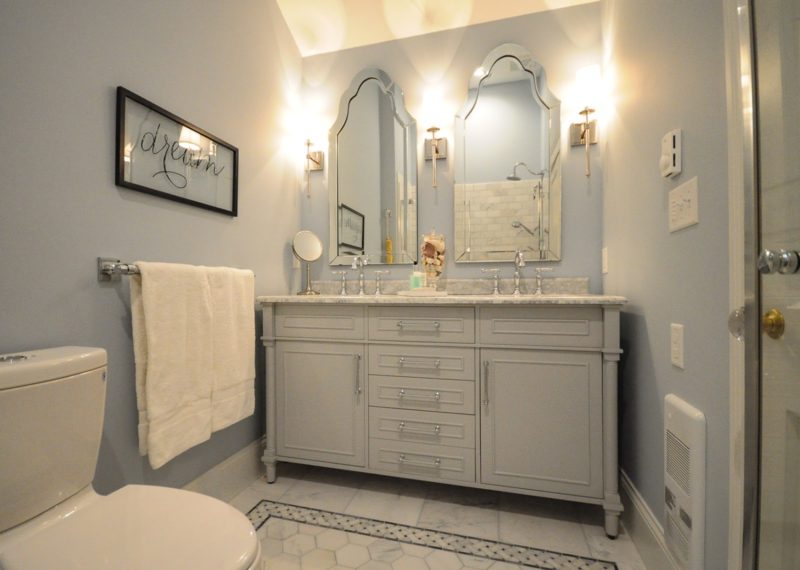 Bathroom with two mirrors over two sinks