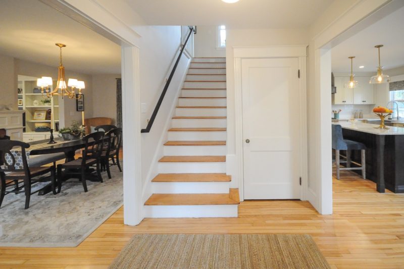 Entry with staircase after remodel