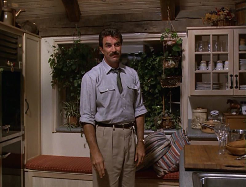 Tom Selleck standing in a kitchen