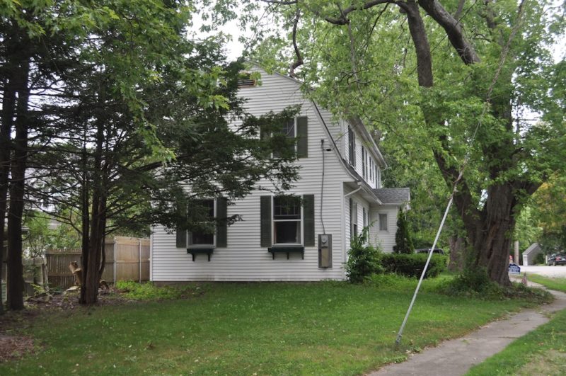 Side exterior view of house before remodel