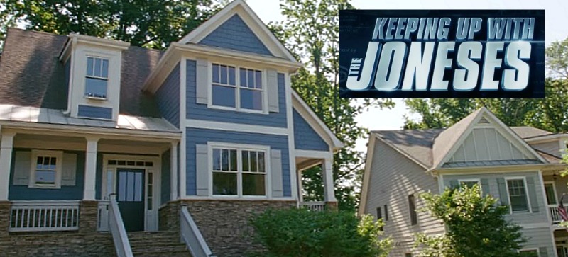 Blue house from Keeping Up with the Joneses house in Atlanta with movie logo inset