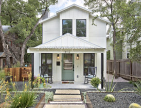 Front exterior of modern farmhouse in Austin with front porch and teal door