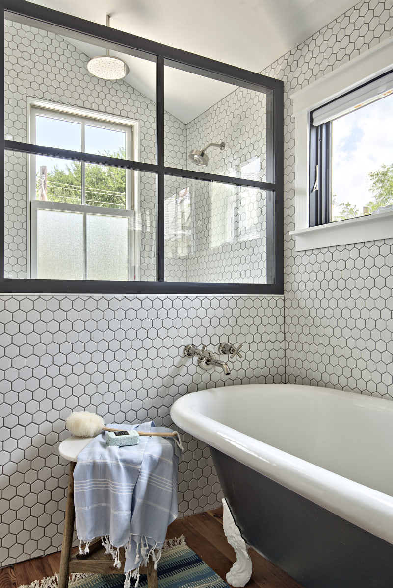 Closeup of white tile behind tub