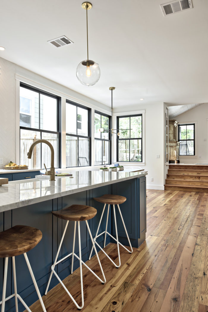 Kitchen island with brass faucet