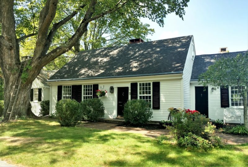 An Antique Cape With Center Chimney In New Hampshire