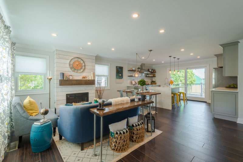 A living room filled with furniture and fireplace