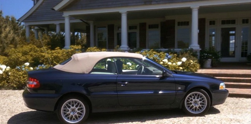 A car parked on the side of beach house