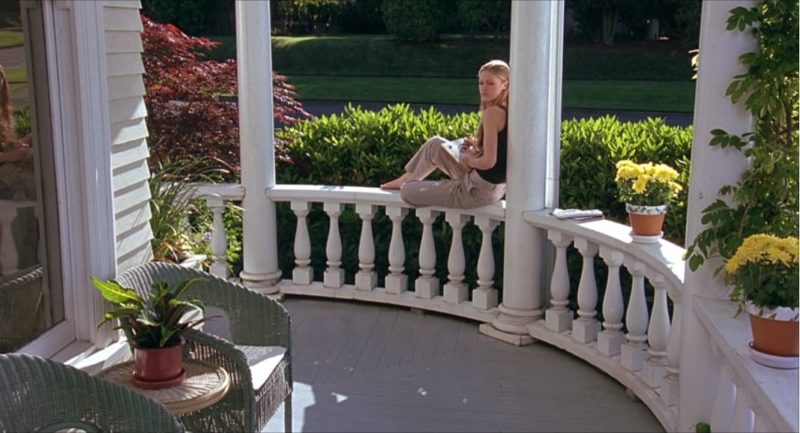 Julia Stiles on front porch